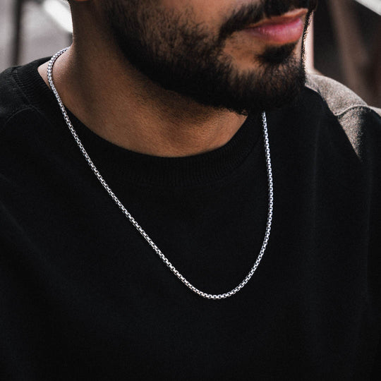 Male model wearing 3mm silver Round Box Chain Size: 22"