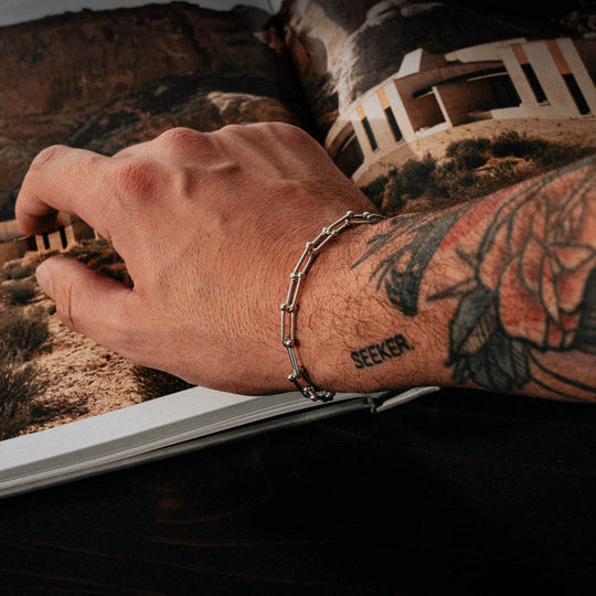 Sterling Silver Roman Bracelet on the wrist of a man&