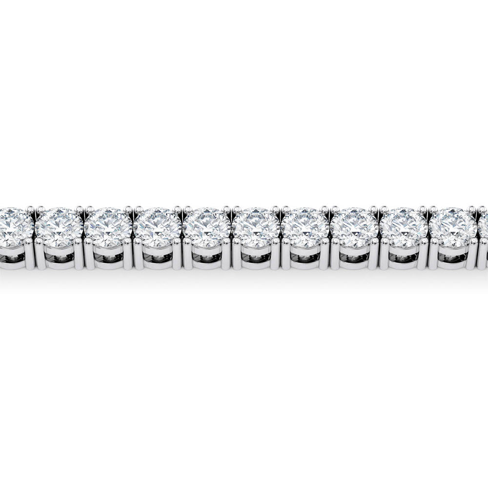 Close up showing silver tennis links with round cut diamonds