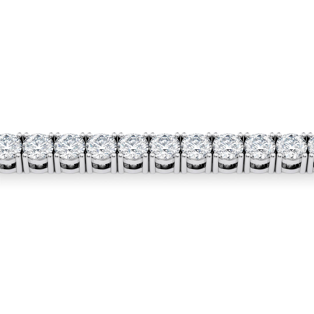 Close up showing silver tennis links with round cut diamonds